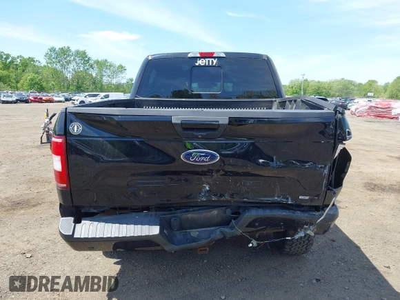 2018 Ford F-150 XL with VIN 1FTEW1EG0JFB61382, listed as a IAAI auction lot 42231412 with 101,376 mi miles and . Bid and sale history available at DreamBid. Image 16.