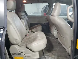 2013 Toyota Sienna XLE AAS with VIN 5TDYK3DC3DS392512, listed as a Copart auction lot 52815845 with 128,561 mi miles and Salvage Title. Bid and sale history available at carsss.com. Image 11.