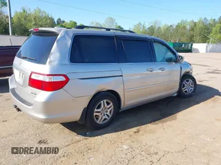 2005 Honda Odyssey EX-L z VIN 5FNRL38715B014905, wystawiony jako IAAI lot #41986395 z przebiegiem 191 029 mil mil oraz . Historia ofert i sprzedaży dostępna na DreamBid. Obrazek 4.