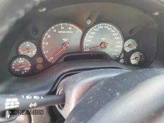 1999 Chevrolet Corvette with VIN 1G1YY22G6X5117332, listed as a Copart auction lot 77683134 with 0 mi miles and Salvage Title. Bid and sale history available at carsss.com. Image 9.
