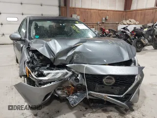 2020 Nissan Sentra S with VIN 3N1AB8BV8LY264005, listed as a IAAI auction lot 42196148 with 63,192 mi miles. Bid and sale history available at carsss.com. Image 6.