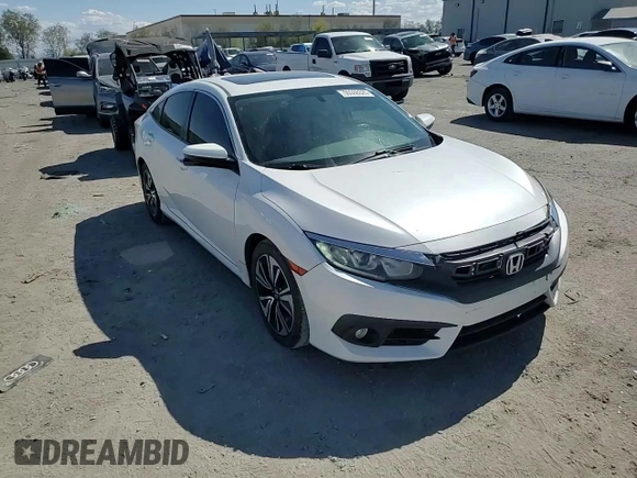2016 Honda Civic EX-T z VIN 19XFC1F35GE029827, wystawiony jako Copart lot #55698325 z przebiegiem 108 297 mil mil oraz Szkoda całkowita • Salvage title. Historia ofert i sprzedaży dostępna na DreamBid. Obrazek 13.