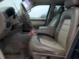 2004 Ford Explorer Eddie Bauer with VIN 1FMDU74W64UB74730, listed as a Copart auction lot 58534535 with 167,112 mi miles and Salvage title. Bid and sale history available at DreamBid. Image 7.