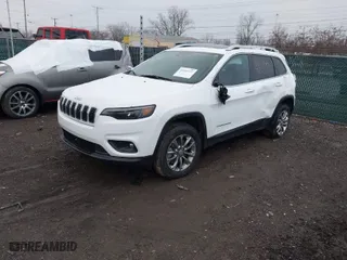2021 Jeep Cherokee Latitude Lux with VIN 1C4PJMMX5MD133846, listed as a IAAI auction lot 41649737 with 145,382 mi miles. Bid and sale history available at carsss.com. Image 2.