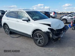 2019 Volkswagen Tiguan SE with VIN 3VV3B7AX9KM067418, listed as a IAAI auction lot 41434045 with 96,968 mi miles and . Bid and sale history available at DreamBid. Image 1.