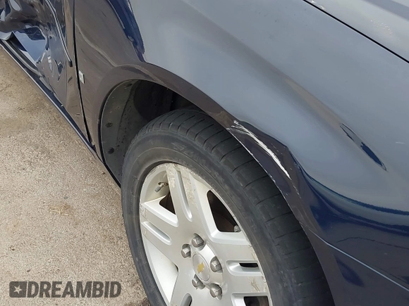 2007 Chevrolet Impala LT with VIN 2G1WC58R679262387, listed as a IAAI auction lot 41971223 with 141,452 mi miles and . Bid and sale history available at DreamBid. Image 18.