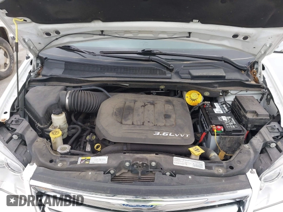 2015 Chrysler Town & Country Touring-L with VIN 2C4RC1CG9FR573863, listed as a IAAI auction lot 42036034 with 141,390 mi miles. Bid and sale history available at carsss.com. Image 10.