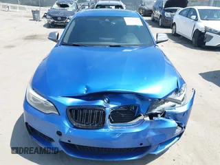 2014 BMW 2 Series M235i with VIN WBA1J7C52EVW84588, listed as a IAAI auction lot 42490194 with 103,998 mi miles and . Bid and sale history available at DreamBid. Image 12.