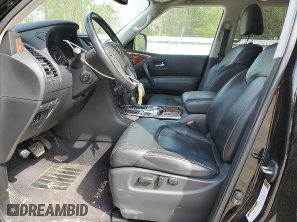 2018 Nissan Armada SV with VIN JN8AY2ND7J9059858, listed as a Copart auction lot 50140715 with 107,126 mi miles and Salvage Title. Bid and sale history available at carsss.com. Image 7.