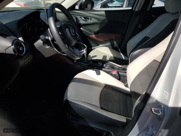 2018 Mazda CX-3 Grand Touring with VIN JM1DKFD77J0310587, listed as a Copart auction lot 49443755 with 70,897 mi miles and Salvage Title. Bid and sale history available at carsss.com. Image 7.