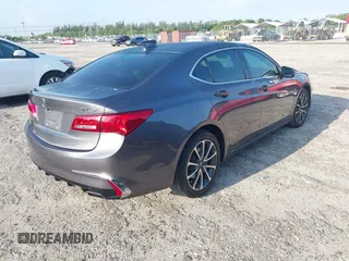 2019 Acura TLX with VIN 19UUB2F39KA004586, listed as a IAAI auction lot 41971144 with 61,081 mi miles and . Bid and sale history available at DreamBid. Image 4.