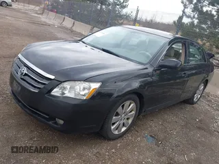 2005 Toyota Avalon XL with VIN 4T1BK36B15U048289, listed as a IAAI auction lot 42094366 with 160,991 mi miles. Bid and sale history available at carsss.com. Image 2.