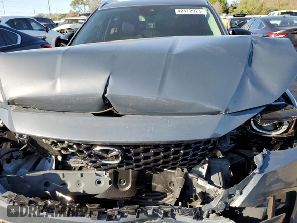 2023 Mazda CX-50 S Premium Plus with VIN 7MMVABEMXPN106060, listed as a Copart auction lot 42472923 with 8,250 mi miles and . Bid and sale history available at DreamBid. Image 13.