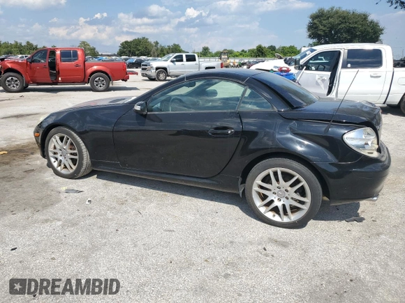 2007 Mercedes-Benz SLK-Class 3.0L with VIN WDBWK54F27F138919, listed as a Copart auction lot 72077514 with 64,519 mi miles and Salvage Title. Bid and sale history available at carsss.com. Image 2.