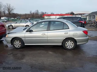 2001 Kia Rio with VIN KNADC123716042067, listed as a IAAI auction lot 41449479 with 113,108 mi miles. Bid and sale history available at carsss.com. Image 14.
