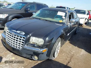 2007 Chrysler 300 C with VIN 2C3LA63H57H762801, listed as a IAAI auction lot 42092286 with 1 mi miles. Bid and sale history available at carsss.com. Image 2.
