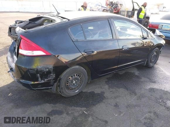 2010 Honda Insight LX with VIN JHMZE2H59AS006887, listed as a IAAI auction lot 41159288 with 263,497 mi miles and . Bid and sale history available at DreamBid. Image 4.