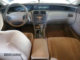 2000 Toyota Avalon XL z VIN 4T1BF28B3YU045264, wystawiony jako Copart lot #57519185 z przebiegiem 157 113 mil mil oraz Szkoda całkowita • Salvage title. Historia ofert i sprzedaży dostępna na DreamBid. Obrazek 8.