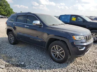 2018 Jeep Grand Cherokee Limited with VIN 1C4RJFBT8JC148802, listed as a Copart auction lot 59283515 with 139,575 mi miles and Salvage title. Bid and sale history available at DreamBid. Image 4.