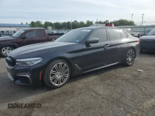 2018 BMW 5 Series M550i xDrive with VIN WBAJB9C55JB035825, listed as a Copart auction lot 58170875 with 70,083 mi miles and Salvage title. Bid and sale history available at DreamBid. Image 1.