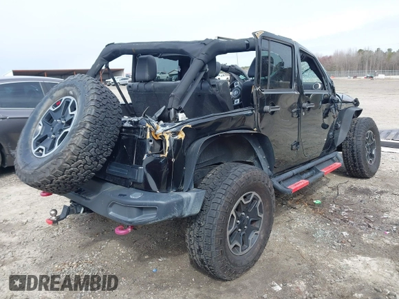 2015 Jeep Wrangler Unlimited Rubicon z VIN 1C4BJWFG7FL711036, wystawiony jako IAAI lot #41604648 z przebiegiem 167 678 mil mil oraz . Historia ofert i sprzedaży dostępna na DreamBid. Obrazek 4.