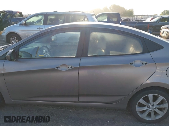 2012 Hyundai Accent GLS with VIN KMHCU4AE4CU097425, listed as a IAAI auction lot 42052740 with 244,705 mi miles. Bid and sale history available at carsss.com. Image 15.