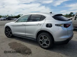 2018 Alfa Romeo Stelvio Ti z VIN ZASFAKBN1J7B70623, wystawiony jako Copart lot #57583795 z przebiegiem 105 351 mil mil oraz Szkoda całkowita • Salvage title. Historia ofert i sprzedaży dostępna na DreamBid. Obrazek 2.