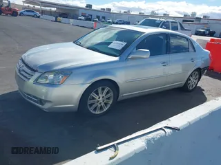 2007 Toyota Avalon XL with VIN 4T1BK36B57U223906, listed as a IAAI auction lot 41591096 with 190,659 mi miles. Bid and sale history available at carsss.com. Image 2.