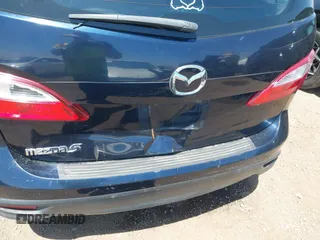 2015 Mazda 5 Sport with VIN JM1CW2BL0F0183911, listed as a IAAI auction lot 42116880 with 154,299 mi miles. Bid and sale history available at carsss.com. Image 6.