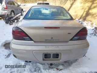 2004 Pontiac Grand Am SE with VIN 1G2NE52F24C231559, listed as a IAAI auction lot 41606544 with 65,524 mi miles. Bid and sale history available at carsss.com. Image 15.