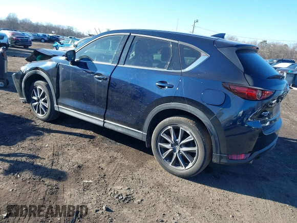 2017 Mazda CX-5 Grand Touring with VIN JM3KFBDL0H0104806, listed as a IAAI auction lot 41621964 with 60,728 mi miles. Bid and sale history available at carsss.com. Image 3.