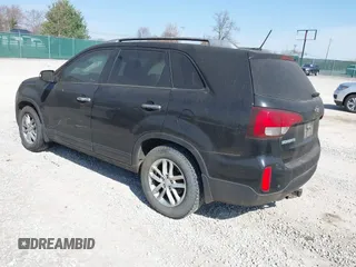 2014 Kia Sorento LX with VIN 5XYKT4A73EG482046, listed as a IAAI auction lot 41811727 with 157,845 mi miles and . Bid and sale history available at carsss.com. Image 3.
