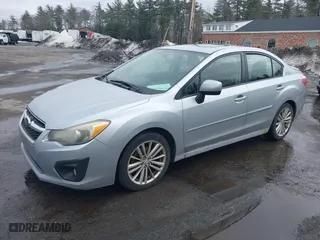 2012 Subaru Impreza Sedan 2.0i Premium with VIN JF1GJAD66CH009507, listed as a IAAI auction lot 41740411 with 203,384 mi miles. Bid and sale history available at carsss.com. Image 2.