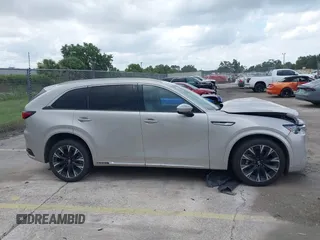 2024 Mazda CX-90 S z VIN JM3KK1HC0R1135680, wystawiony jako IAAI lot #42492399 z przebiegiem 38 940 mil mil oraz . Historia ofert i sprzedaży dostępna na DreamBid. Obrazek 14.