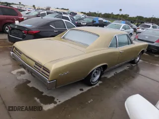 1967 Pontiac GTO z VIN 242077Z108825, wystawiony jako Copart lot #74747314 z przebiegiem 84 793 mil mil oraz Szkoda całkowita • Salvage title. Historia ofert i sprzedaży dostępna na DreamBid. Obrazek 3.