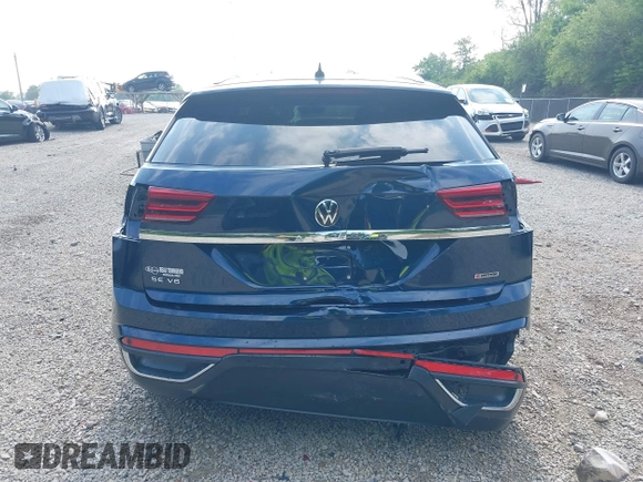 2022 Volkswagen Atlas SE z VIN 1V2HE2CA7NC211835, wystawiony jako IAAI lot #42722660 z przebiegiem 56 112 mil mil oraz . Historia ofert i sprzedaży dostępna na DreamBid. Obrazek 17.
