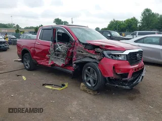 2023 Honda Ridgeline RTL-E with VIN 5FPYK3F77PB050822, listed as a IAAI auction lot 42709309 with 4,340 mi miles and . Bid and sale history available at DreamBid. Image 1.