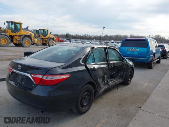 2015 Toyota Camry LE with VIN 4T1BD1FK6FU157623, listed as a IAAI auction lot 42015005 with 300,974 mi miles and . Bid and sale history available at DreamBid. Image 4.