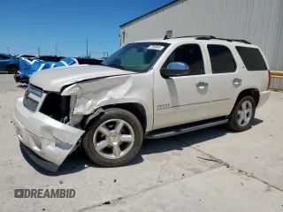 2013 Chevrolet Tahoe LTZ with VIN 1GNSCCE01DR202073, listed as a Copart auction lot 57860895 with 230,231 mi miles and Salvage title. Bid and sale history available at DreamBid. Image 1.