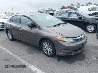 2012 Honda Civic EX with VIN 2HGFB2F89CH517330, listed as a IAAI auction lot 42116208 with 196,861 mi miles and . Bid and sale history available at DreamBid. Image 1.