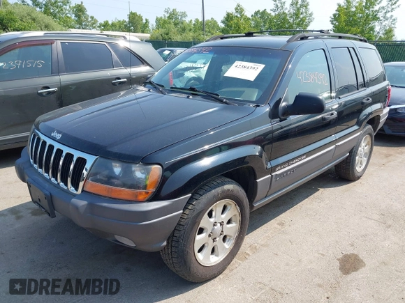 2001 Jeep Grand Cherokee Laredo with VIN 1J4GW48S31C558946, listed as a IAAI auction lot 42384392 with 252,393 mi miles and . Bid and sale history available at DreamBid. Image 2.