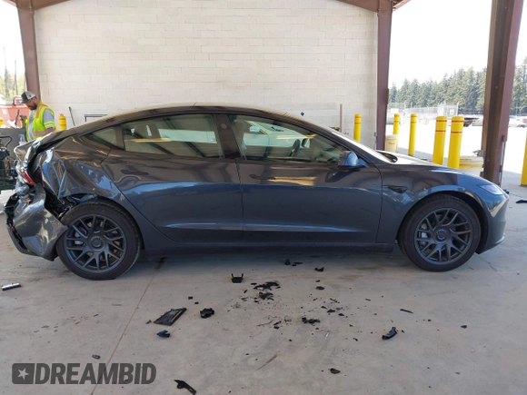 2025 Tesla Model 3 Long Range with VIN 5YJ3E1EA1SF923548, listed as a IAAI auction lot 42046257 with 3,979 mi miles and . Bid and sale history available at carsss.com. Image 13.
