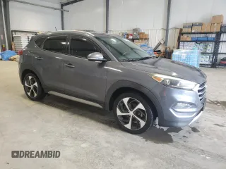 2017 Hyundai Tucson Sport with VIN KM8J3CA26HU346549, listed as a Copart auction lot 52741415 with 102,779 mi miles and Clean Title. Bid and sale history available at DreamBid. Image 4.
