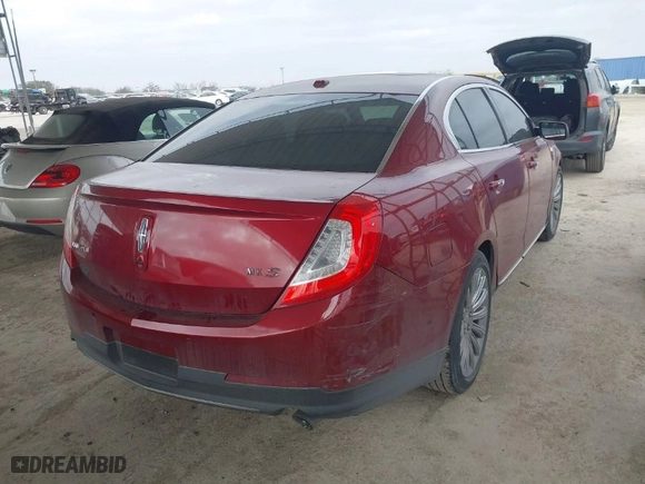 2013 Lincoln MKS with VIN 1LNHL9DK9DG601703, listed as a IAAI auction lot 41751743 with 101316 miles. Bid and sale history available at carsss.com. Image 4.