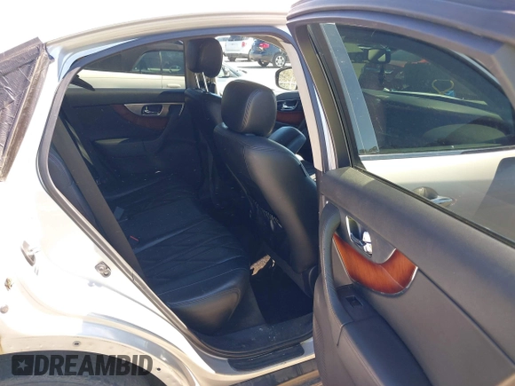 2010 Infiniti FX z VIN JN8AS1MU9AM802157, wystawiony jako IAAI lot #41699229 z przebiegiem 221 816 mil mil oraz . Historia ofert i sprzedaży dostępna na DreamBid. Obrazek 8.