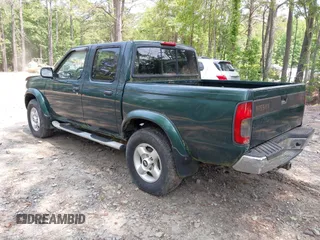 2000 Nissan Frontier XE z VIN 1N6ED27TXYC350670, wystawiony jako IAAI lot #42422277 z przebiegiem 192 897 mil mil oraz . Historia ofert i sprzedaży dostępna na DreamBid. Obrazek 3.