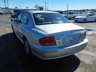 2003 Hyundai Sonata GLS with VIN KMHWF35H23A909117, listed as a IAAI auction lot 41535679 with 149,285 mi miles. Bid and sale history available at carsss.com. Image 3.