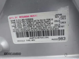 2007 Mitsubishi Outlander LS z VIN JA4MT31X67U011541, wystawiony jako IAAI lot #42265073 z przebiegiem 92 230 mil mil oraz . Historia ofert i sprzedaży dostępna na DreamBid. Obrazek 9.