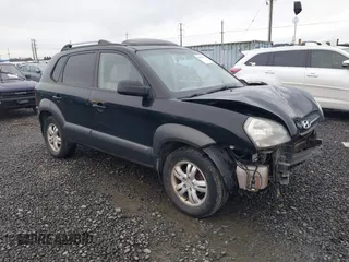 2006 Hyundai Tucson GLS with VIN KM8JN72D66U338658, listed as a IAAI auction lot 41828712 with 198,185 mi miles. Bid and sale history available at carsss.com. Image 1.