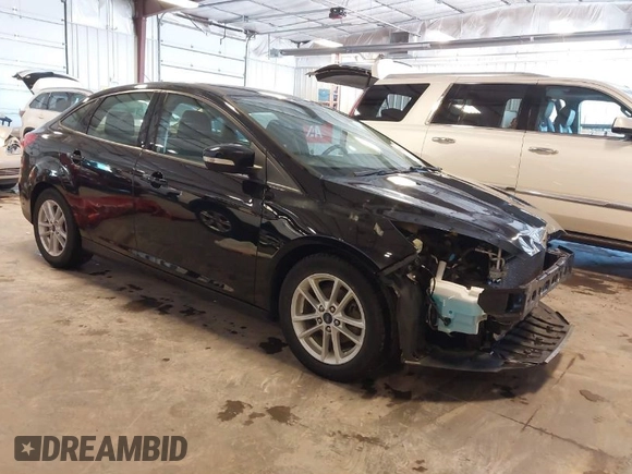 2018 Ford Focus SE with VIN 1FADP3F23JL215479, listed as a IAAI auction lot 41936036 with 96,560 mi miles. Bid and sale history available at carsss.com. Image 1.